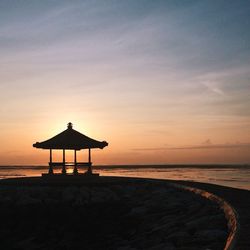 Scenic view of sea at sunset