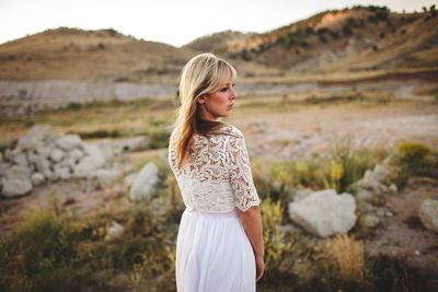 Full length of woman standing on land