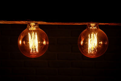 Close-up of illuminated light bulb