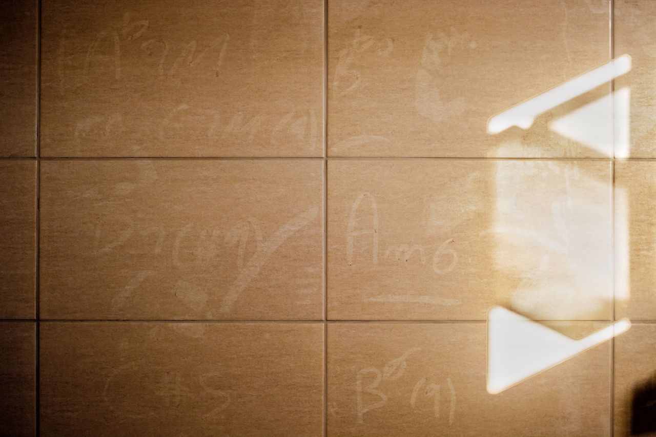 FULL FRAME SHOT OF PAPERS ON FLOOR