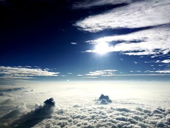 Scenic view of snow covered mountain against sky