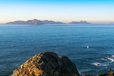 Punta lameda lighthouse in monteferro with the cies islands in the background. nigrán - spain