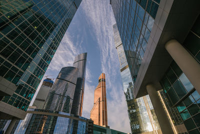 Low angle view of modern buildings against sky