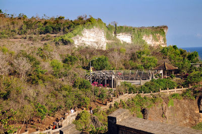 High angle view of trees and buildings against sky