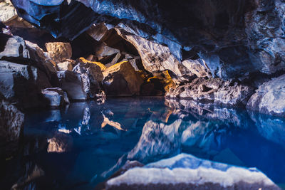 Close-up of rock formation in water