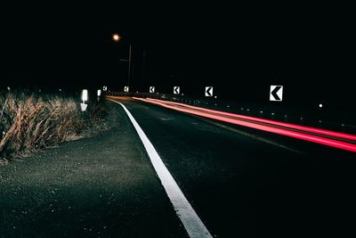 Cars moving on road at night