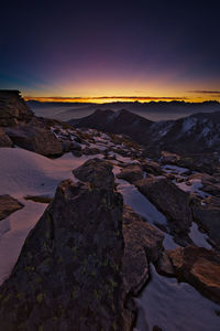 Scenic view of mountain against sky during sunset