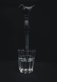 Close-up of glass against black background