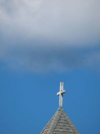 Low angle view of building against blue sky