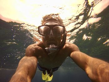 Man swimming in sea