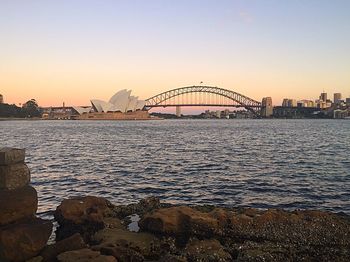 View of bridge over sea in city