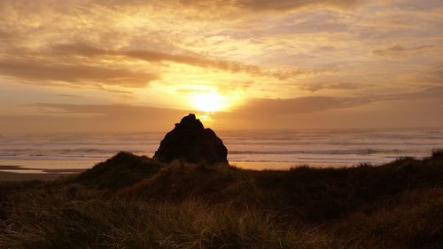 Scenic view of sea during sunset