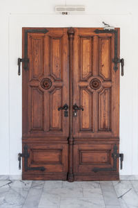 Closed wooden door of building