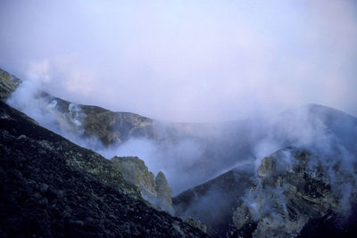 Scenic view of rocky mountains against sky