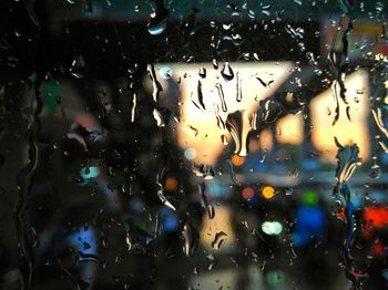 Close-up of water drops on glass window