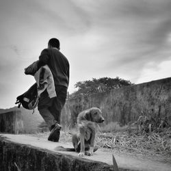 Close-up of dog against sky