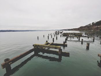 Pier on sea against sky