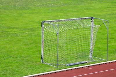 Soccer field against green landscape