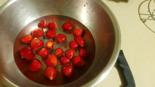 High angle view of strawberries in container