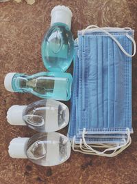 High angle view of blue bottle on table