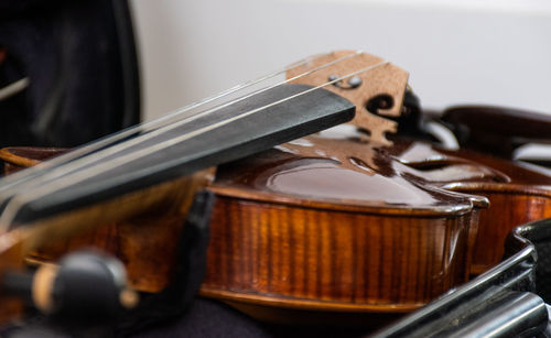 Close-up of guitar on table