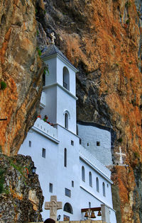 Low angle view of church in mountains