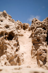 Rock formations in desert against clear sky