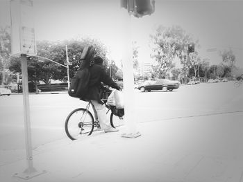 Man walking on road