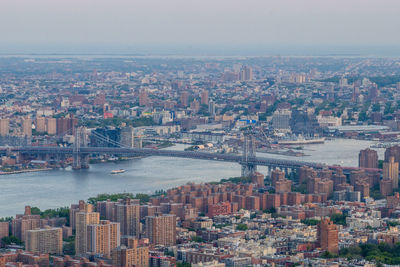 High angle view of river amidst buildings in city