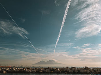 Scenic view of vapor trails against sky