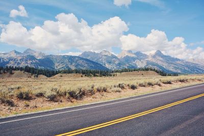 Country road passing through landscape