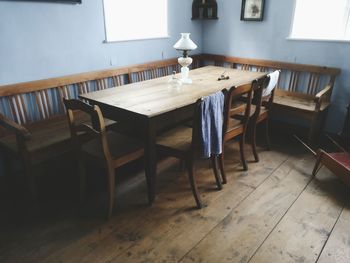 Empty chairs and tables in restaurant