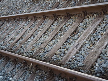 High angle view of gravels on railroad track