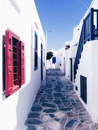 Cobblestone street amidst buildings