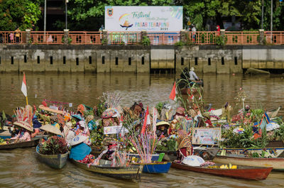 Boats moored at harbor