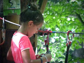 Portrait of girl drinking outdoors