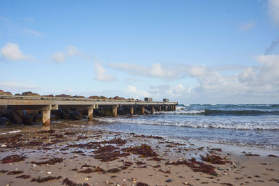 Scenic view of beach against sky