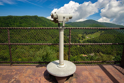 Built structure on land against sky