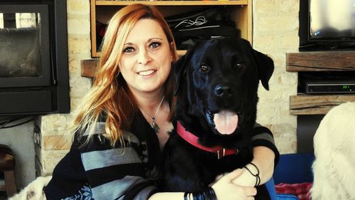 Portrait of woman with dog
