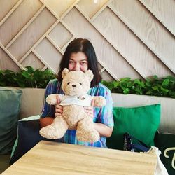 Pretty woman and teddy bear