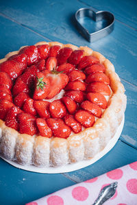 High angle view of strawberries on cake