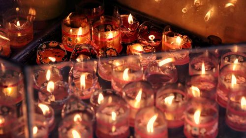 Close-up of burning candles