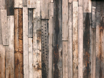 Full frame shot of weathered wooden door