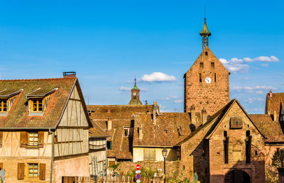 View of buildings in city against sky