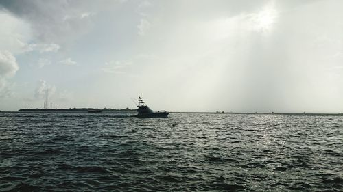 Boats sailing in sea