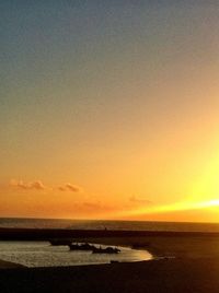 Scenic view of sea at sunset