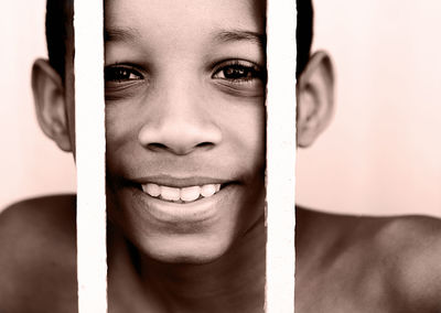 Close-up portrait of smiling mid adult man