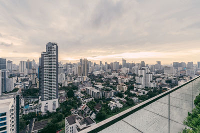 High angle view of buildings in city against sky