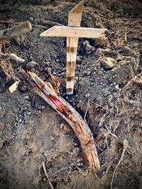 High angle view of cross on land