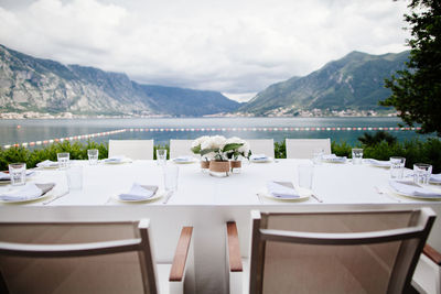 Empty chairs and table in restaurant